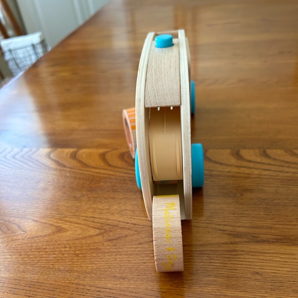 Melissa & Doug GO Tots
Wooden Roll & Ride Bus with 3 Disks - Picture 5 of 6